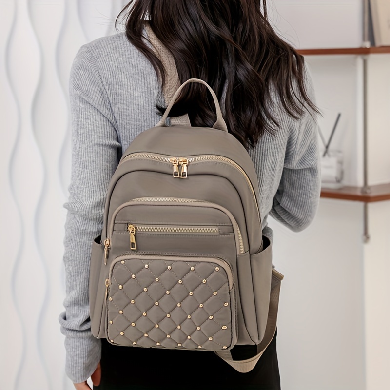casual solid color backapck quilted rivets decor rucksack zipper womens travel rucksack details 4